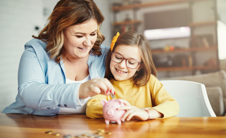 Woman and child with a piggy bank